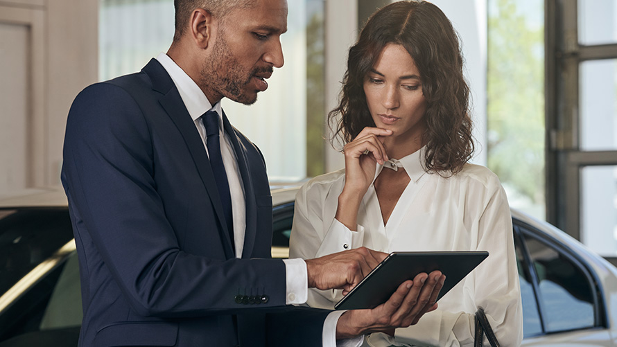 BMW Service employee helps customer