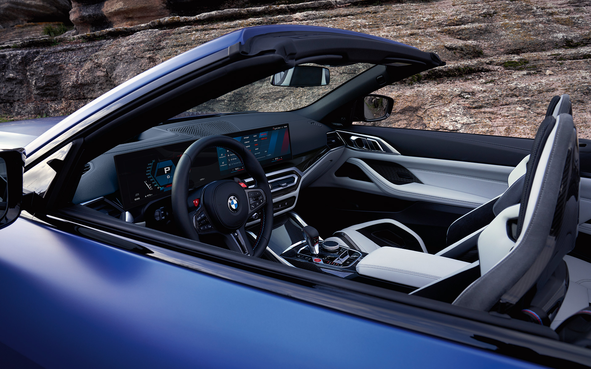 BMW M4 Competition Convertible with M xDrive G83 2021 BMW Individual Frozen Portimao Blue metallic cockpit and interior with open softtop