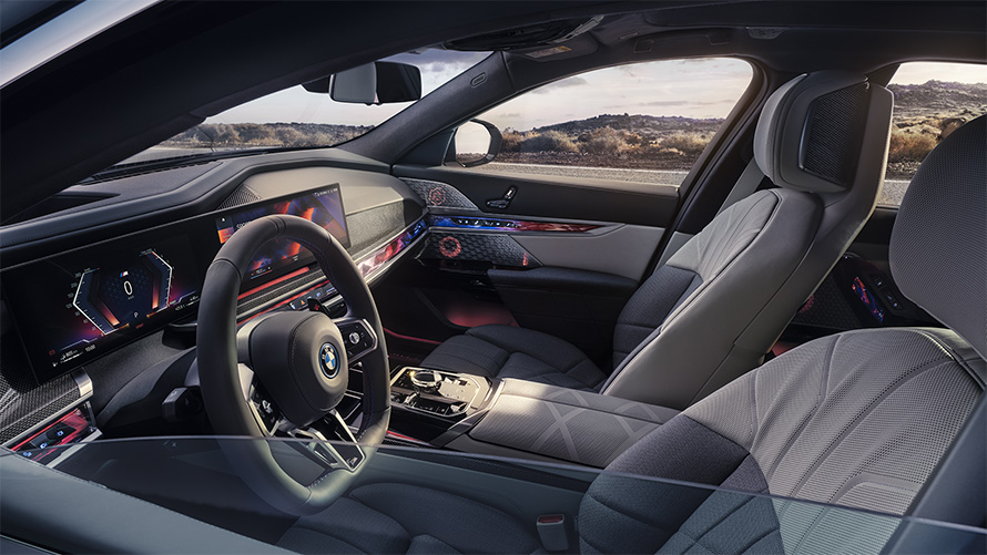 My Mode Sport BMW M760e xDrive Sedan G70 View from the outside through half-closed window glass into the interior