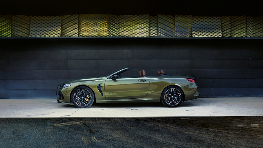 BMW M8 Competition Convertible F91 LCI Facelift 2022 BMW Individual Brass metallic side view on stage