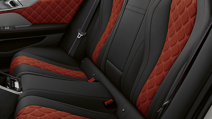 BMW M8 Competition Gran Coupé F93 LCI Facelift 2022 Interior rear seats with M specific safety belts