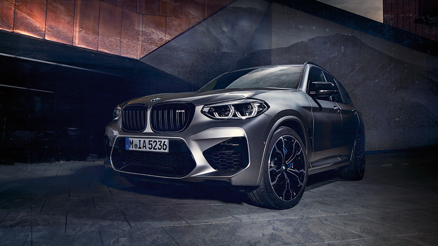 BMW X3 M Competition in Donington Grey, exterior, three-quarter front view.