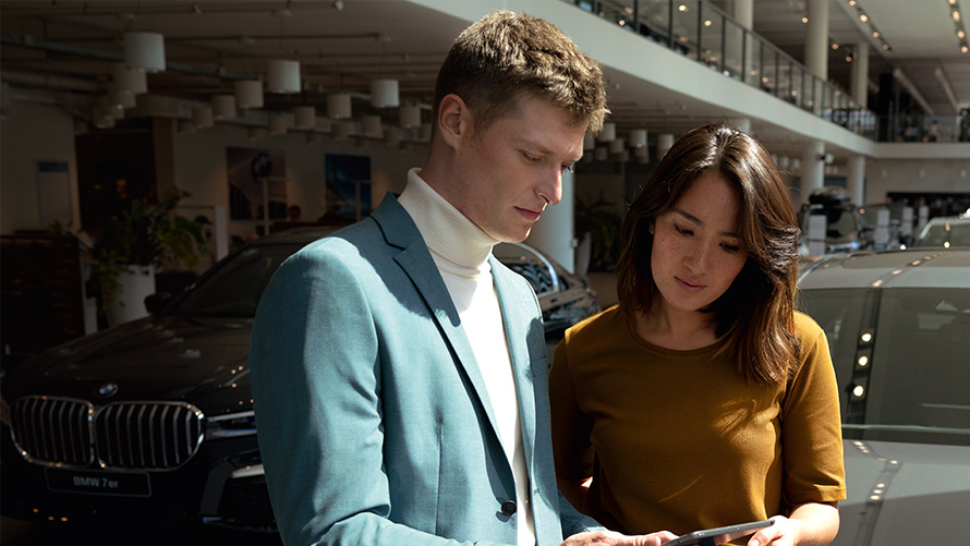 BMW employee advises a customer