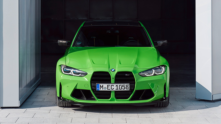 BMW M4 Competition Coupé G82 2021 BMW Individual Signal Green front view standing in gateway
