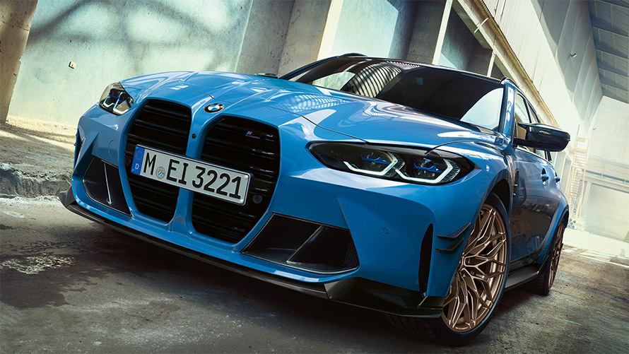 BMW M3 Touring G81 BMW M Performance Parts three-quarter front view driving